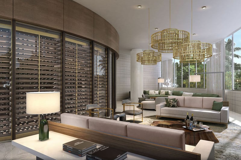 Wine lounge with a curved cellar wall, designer chandeliers and conversational seating at Park Grove in Coconut Grove, elevating the luxury and ultra luxury condos experience.