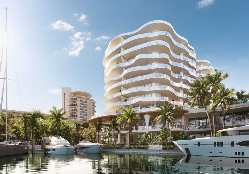 Waterfront luxury condominium at Pier Sixty-Six in Fort Lauderdale, featuring flowing architectural lines, expansive glass terraces, tropical landscaping, and a private marina with yachts along the intracoastal. Featuring modern, condo, sunset, and view.