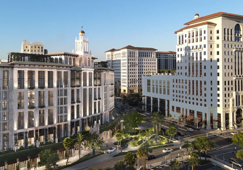Aerial street view of downtown Coral Gables, Miami featuring Ponce Park Residences among iconic towers, presenting luxury and ultra luxury preconstruction condos in the heart of the neighborhood cityscape.