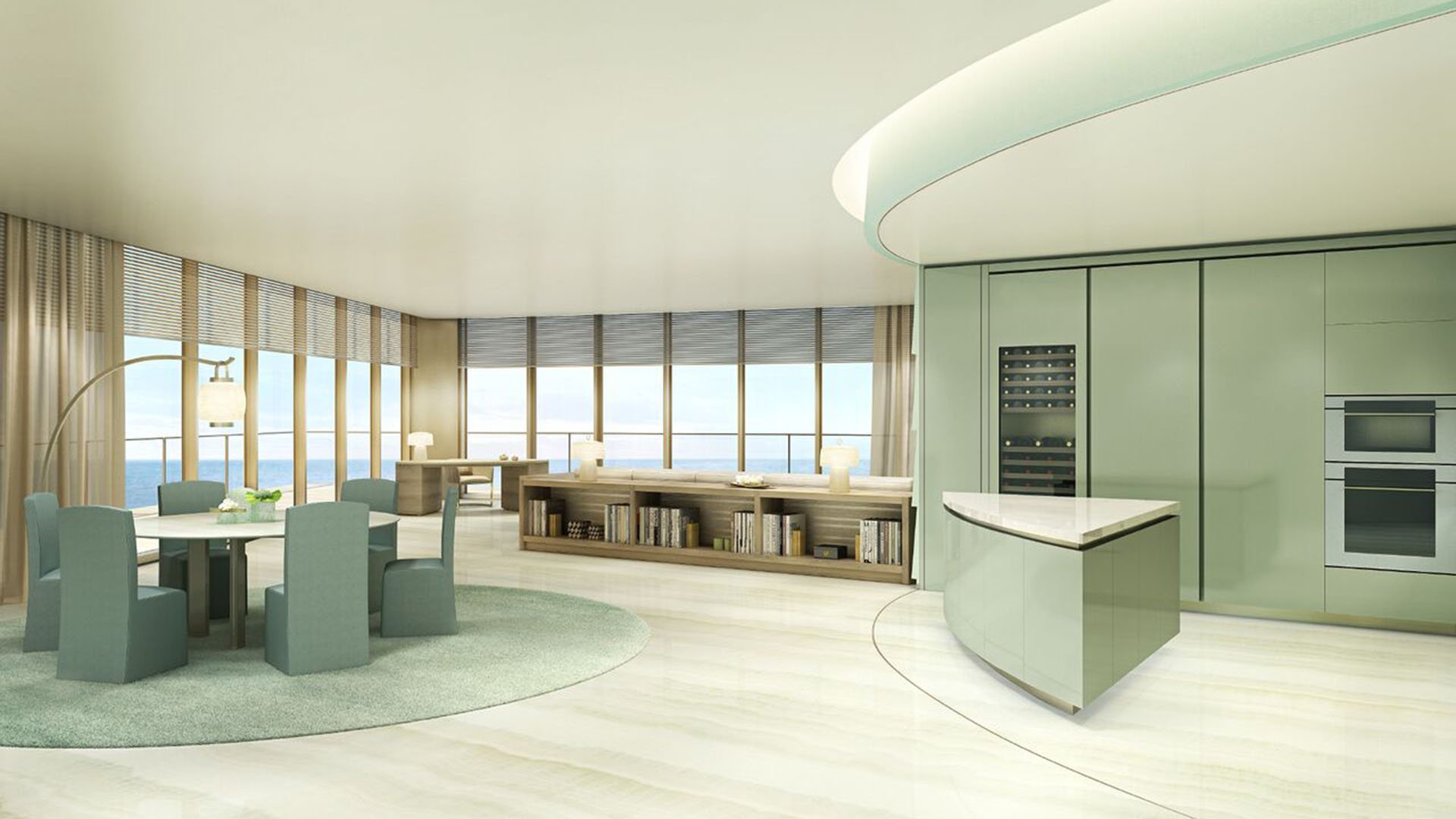 Residences by Armani Casa, Sunny Isles Beach luxury and ultra luxury preconstruction condos, curved chef kitchen and round dining area with floor-to-ceiling glass and wide ocean views.