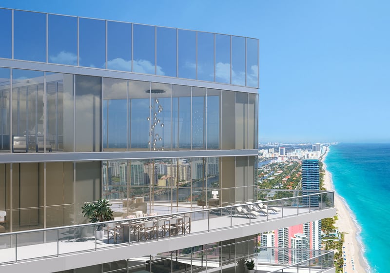 Residences by Armani Casa, Sunny Isles Beach luxury and ultra luxury preconstruction condos, glass corner exterior with expansive terraces overlooking the beachfront and coastal skyline.