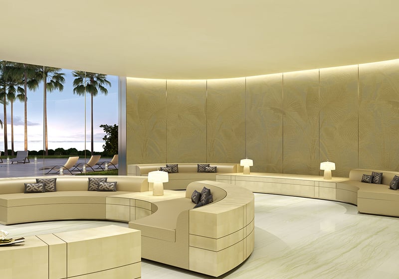Residences by Armani Casa, Sunny Isles Beach luxury and ultra luxury preconstruction condos, grand lobby lounge with sculptural curved sofas, warm lighting, and tropical landscaping outside.