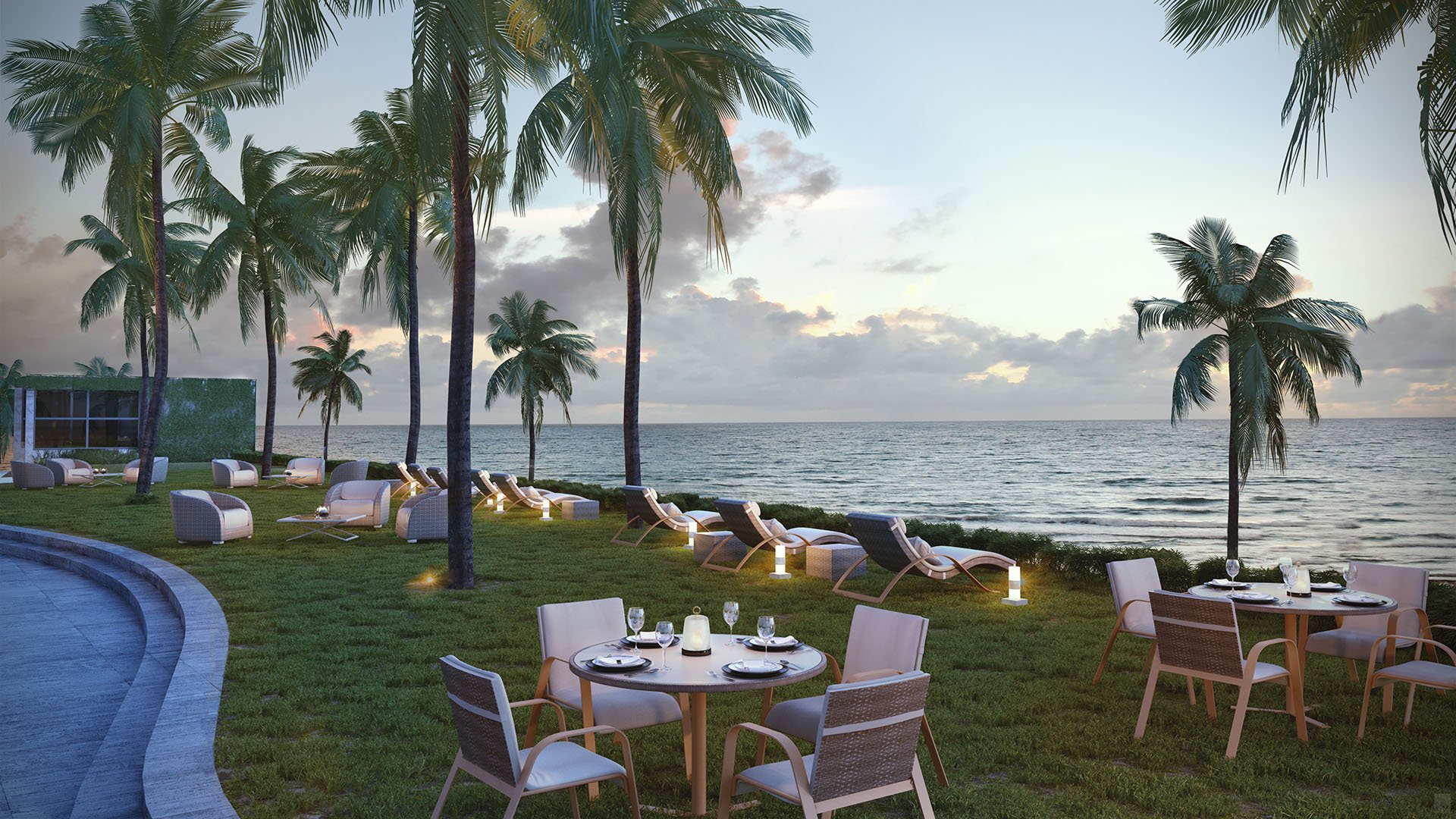 Residences by Armani Casa, Sunny Isles Beach luxury and ultra luxury preconstruction condos, oceanfront garden terrace with cafe tables, lounge seating, palms, and manicured lawn at the edge of the beach.
