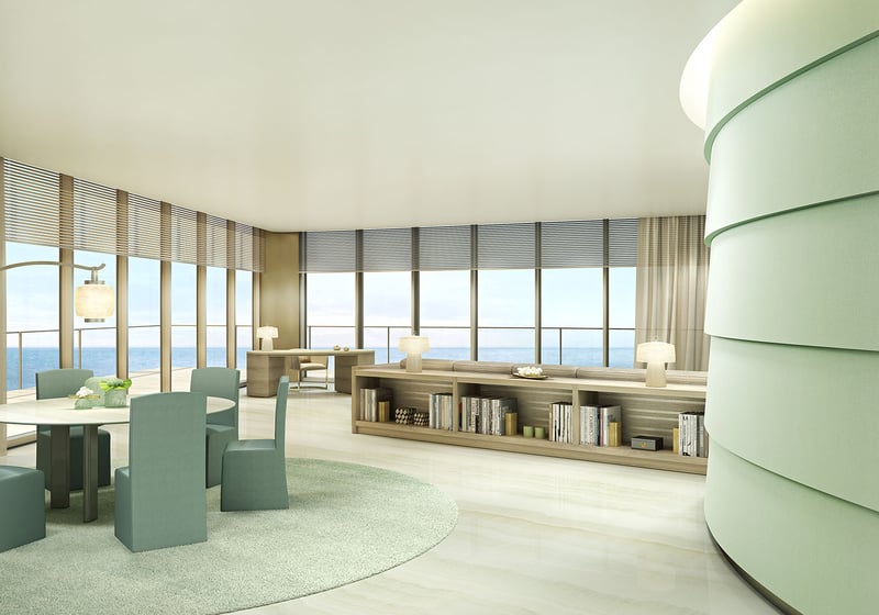 Residences by Armani Casa, Sunny Isles Beach luxury and ultra luxury preconstruction condos, open-concept great room with a curved kitchen wall, dining area, and panoramic ocean-facing glass.
