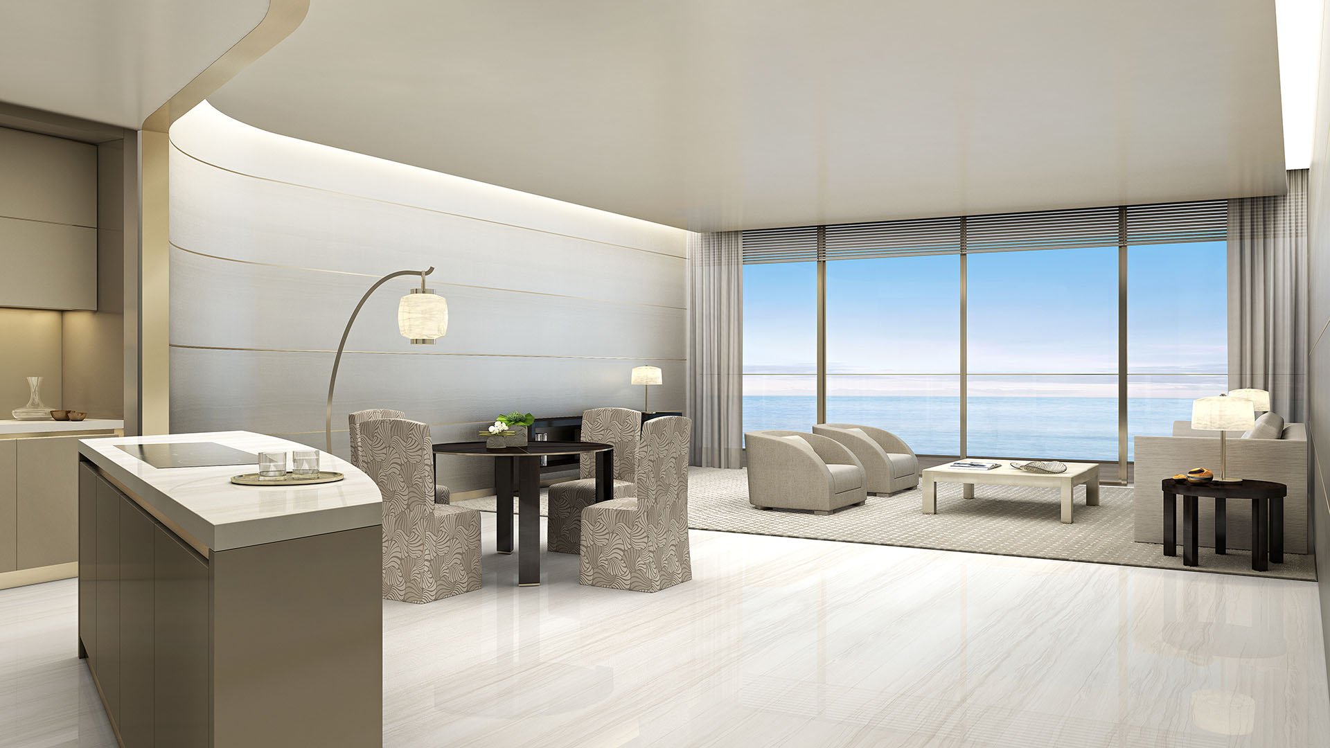 Residences by Armani Casa, Sunny Isles Beach luxury and ultra luxury preconstruction condos, open-plan kitchen, dining, and living room with curved walls, polished floors, and ocean views.