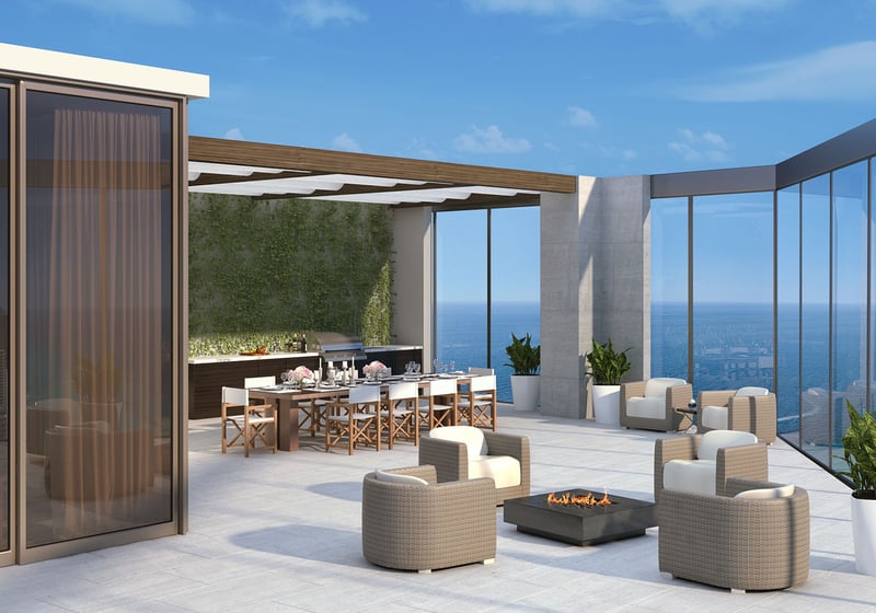 Residences by Armani Casa, Sunny Isles Beach luxury and ultra luxury preconstruction condos, pergola lounge terrace with outdoor dining, cushioned seating, and elevated ocean views.