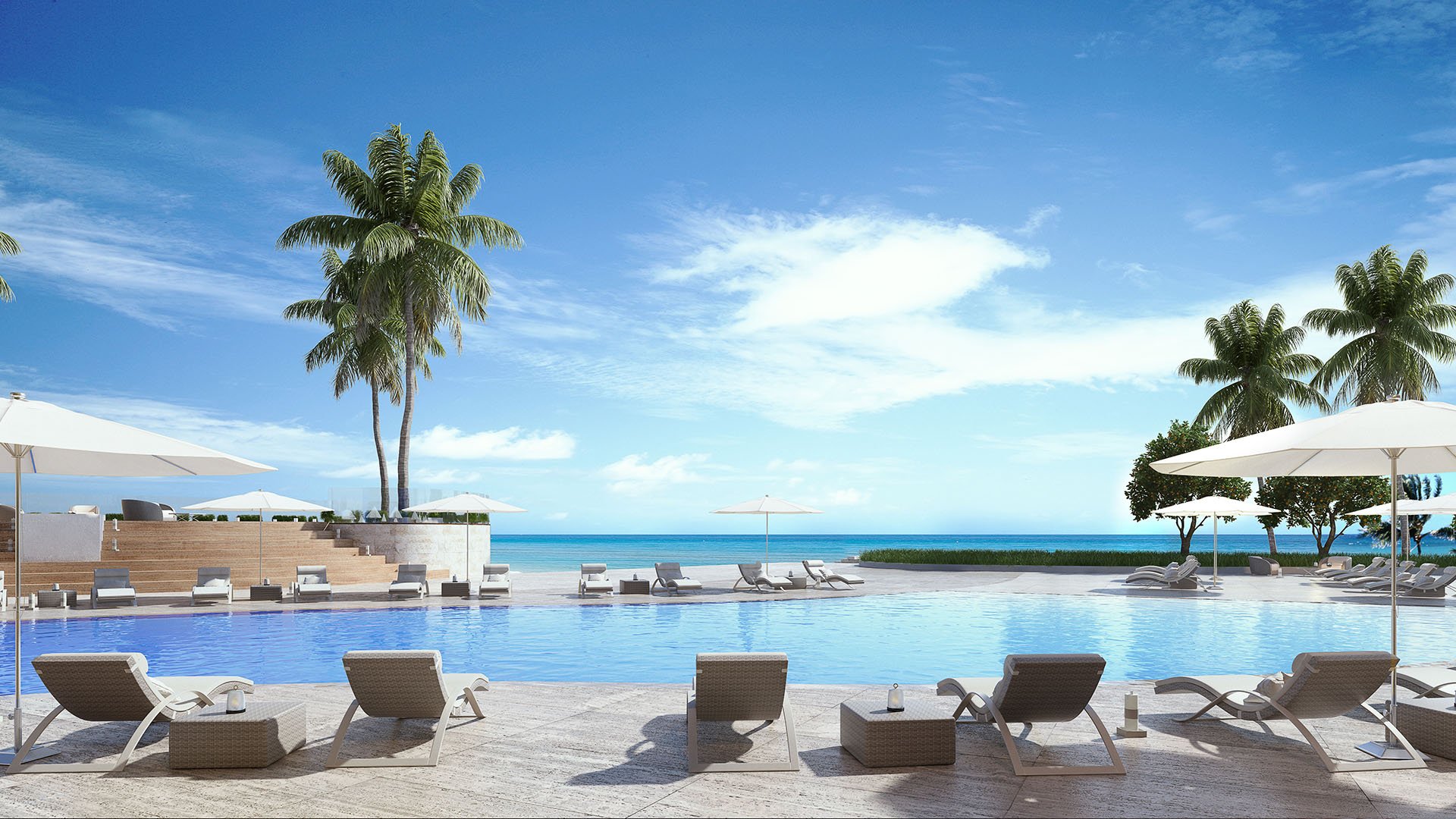 Residences by Armani Casa, Sunny Isles Beach luxury and ultra luxury preconstruction condos, resort-style pool terrace with loungers, umbrellas, palms, and a direct beachfront view.