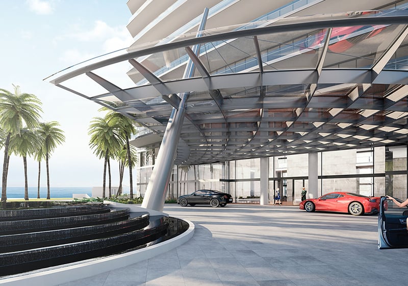Residences by Armani Casa, Sunny Isles Beach luxury and ultra luxury preconstruction condos, valet arrival with a dramatic canopy, circular fountain, luxury cars, and ocean glimpses.