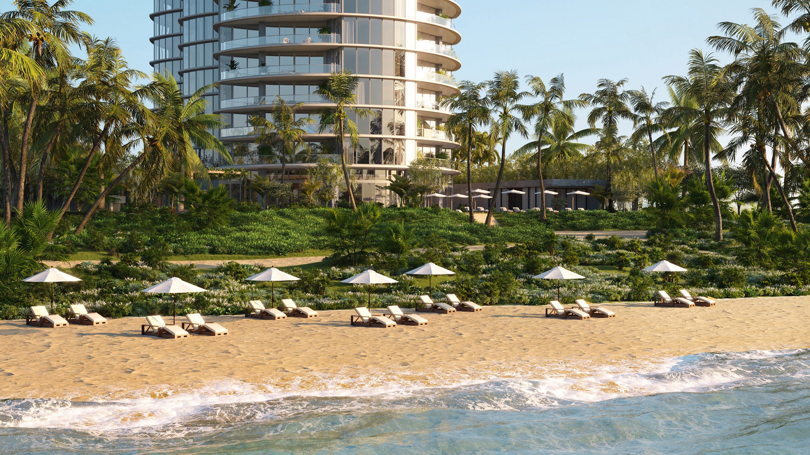 Rivage Bal Harbour, Miami beachfront resort terrace with lounge chairs, five‑star amenities for luxury and ultra luxury condos; premier preconstruction.