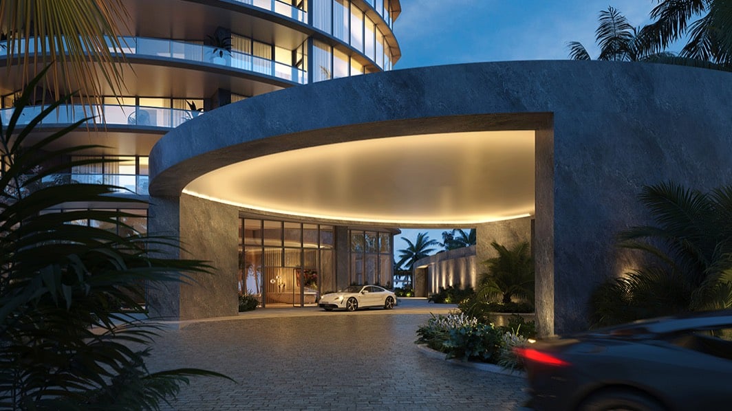 Rivage Bal Harbour luxury apartment entrance at night, porte‑cochère glow in Bal Harbour, Miami, arrival for luxury and ultra luxury condos; preconstruction.