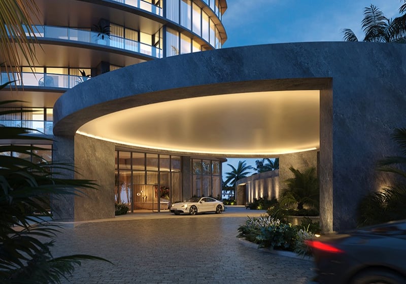Rivage Bal Harbour luxury apartment entrance at night, porte‑cochère glow in Bal Harbour, Miami, arrival for luxury and ultra luxury condos; preconstruction.
