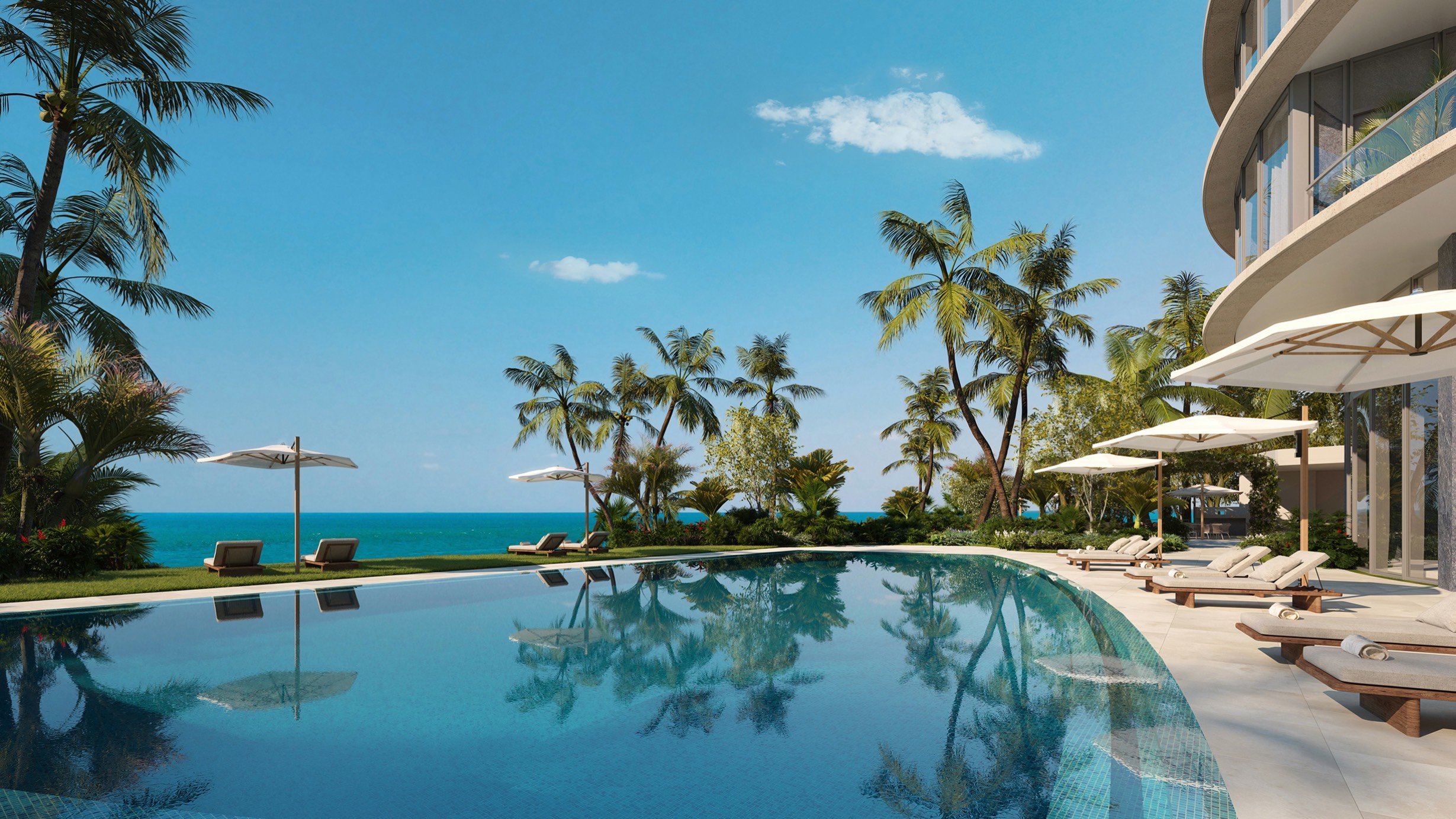 Rivage Bal Harbour poolside resort deck with ocean view in Bal Harbour, Miami, cabanas and palm‑lined amenities for luxury and ultra luxury condos; preconstruction.