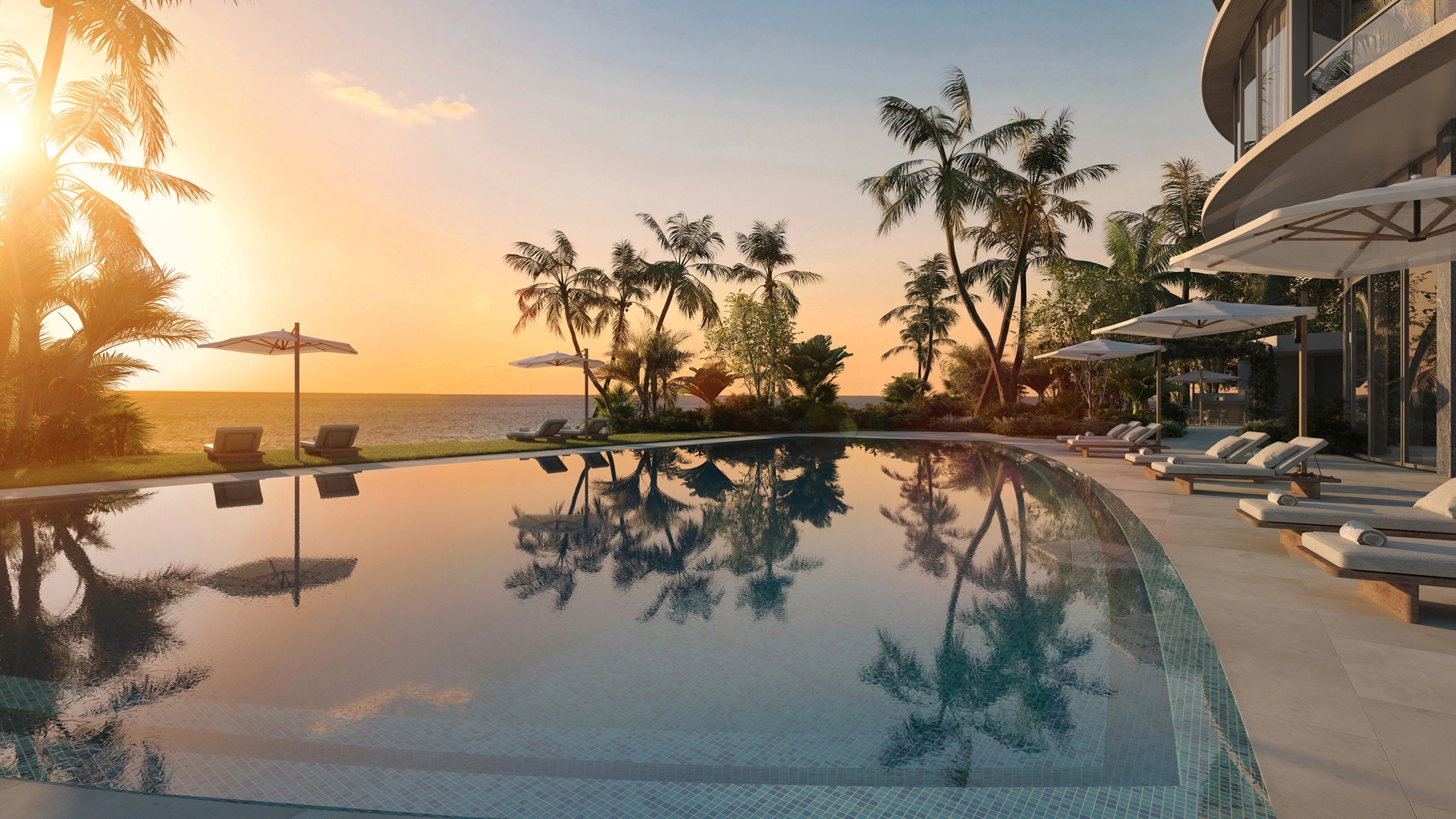 Rivage Bal Harbour, Bal Harbour Miami tropical pool at sunset - resort deck for luxury and ultra luxury condos; preconstruction.