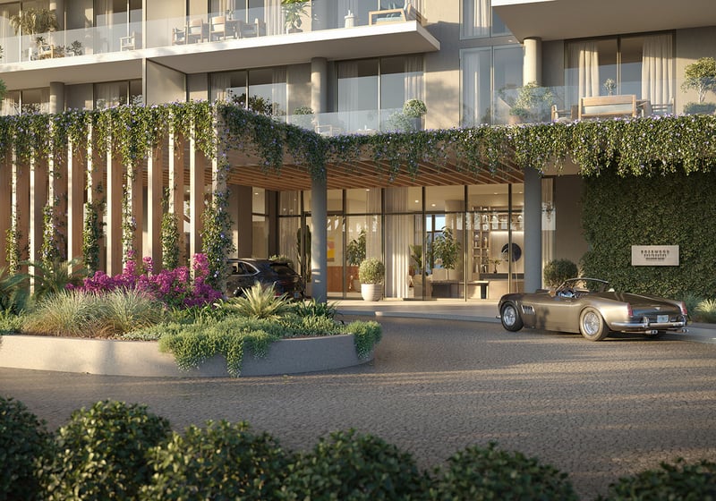 Arrival porte cochere at Rosewood Residences Hillsboro Beach on Hillsboro Mile, Florida, with lush landscaped entry and lobby drop-off, showcasing luxury and ultra luxury preconstruction condos.