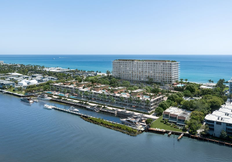 Aerial hero of Rosewood Residences Hillsboro Beach, Florida on the Intracoastal Waterway with private marina docks and yachts, Atlantic Ocean backdrop, highlighting luxury and ultra luxury preconstruction condos.