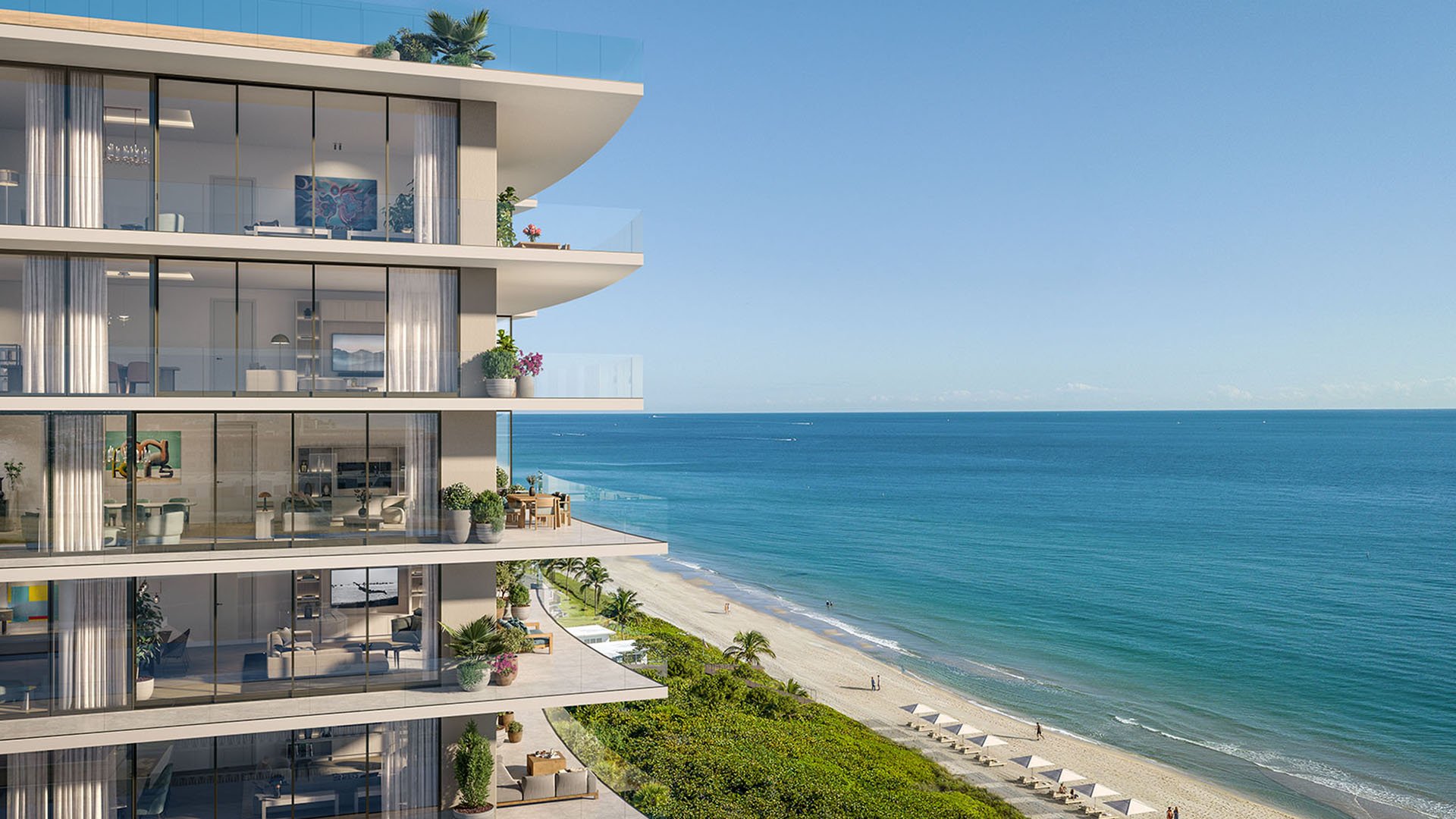 Oceanfront corner residence balcony at Rosewood Residences Hillsboro Beach, Florida with wraparound terrace and floor-to-ceiling glass overlooking the Atlantic Ocean, luxury and ultra luxury preconstruction condos.