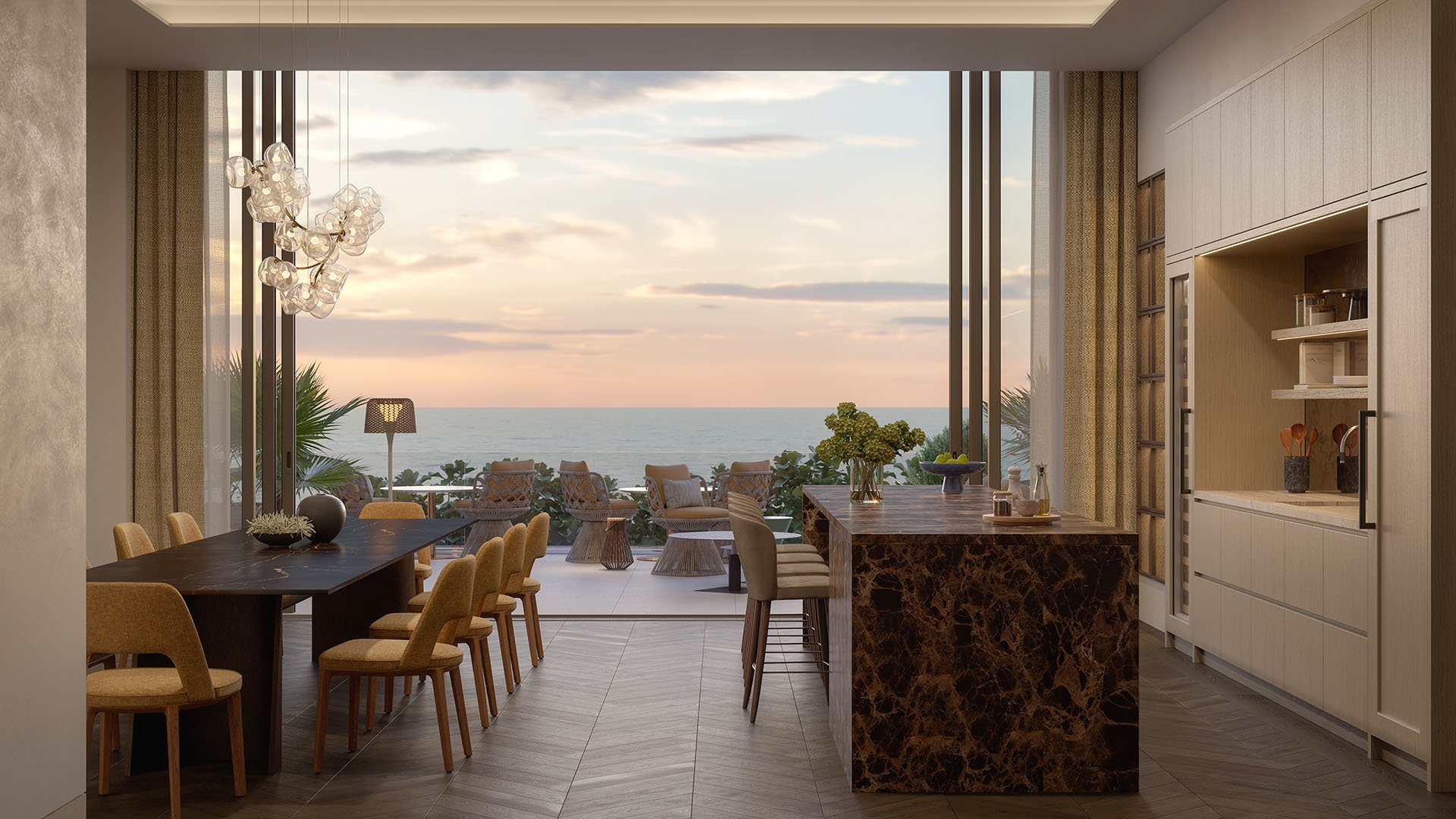 Rosewood Residences Hillsboro Beach, Florida private dining room and chef kitchen with marble island, long dining table and sunset Atlantic Ocean views, featuring luxury and ultra luxury preconstruction condos.
