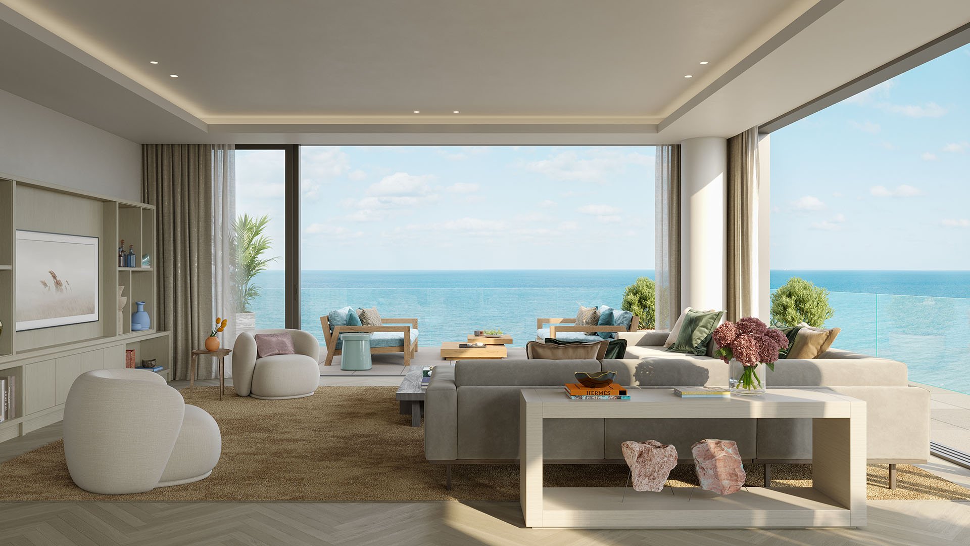 Rosewood Residences Hillsboro Beach, Florida great room open living area with panoramic Atlantic Ocean views and expansive terrace, representing luxury and ultra luxury preconstruction condos.