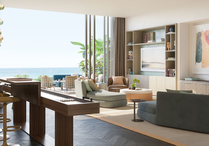 Rosewood Residences Hillsboro Beach, Florida teens game lounge with shuffleboard table, bar stools and ocean-view windows, amenities for luxury and ultra luxury preconstruction condos.