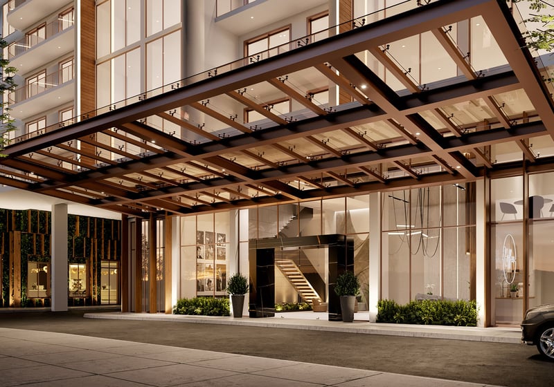 Shoma Bay arrival porte cochere with glass canopy and modern lobby entrance in North Bay Village, Miami, Florida, highlighting luxury and ultra luxury preconstruction condos with resort-style curb appeal.