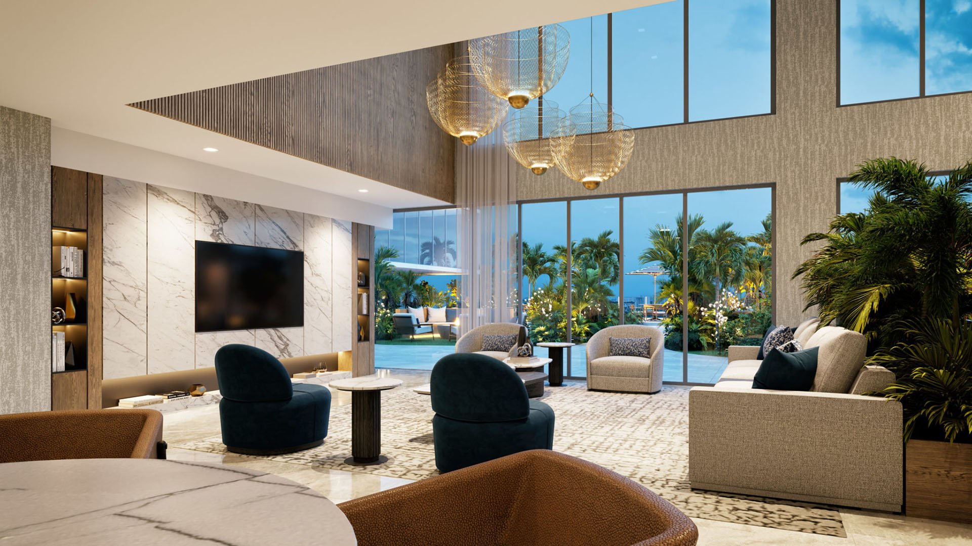 Residents media lounge with marble TV wall, indoor-outdoor seating and tropical terrace at Shoma Bay in North Bay Village, Miami, Florida, highlighting luxury and ultra luxury preconstruction condos lifestyle amenities.
