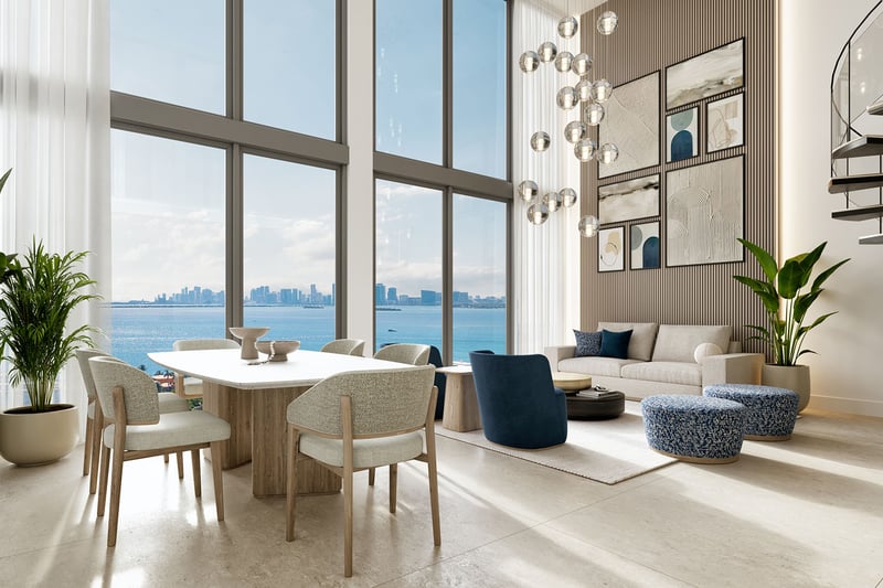 Shoma Bay North Bay Village, Miami, Florida Penthouse 2 double-height living room and dining area with spiral staircase, floor-to-ceiling windows, glass globe chandelier and Biscayne Bay views, luxury and ultra luxury preconstruction condos.