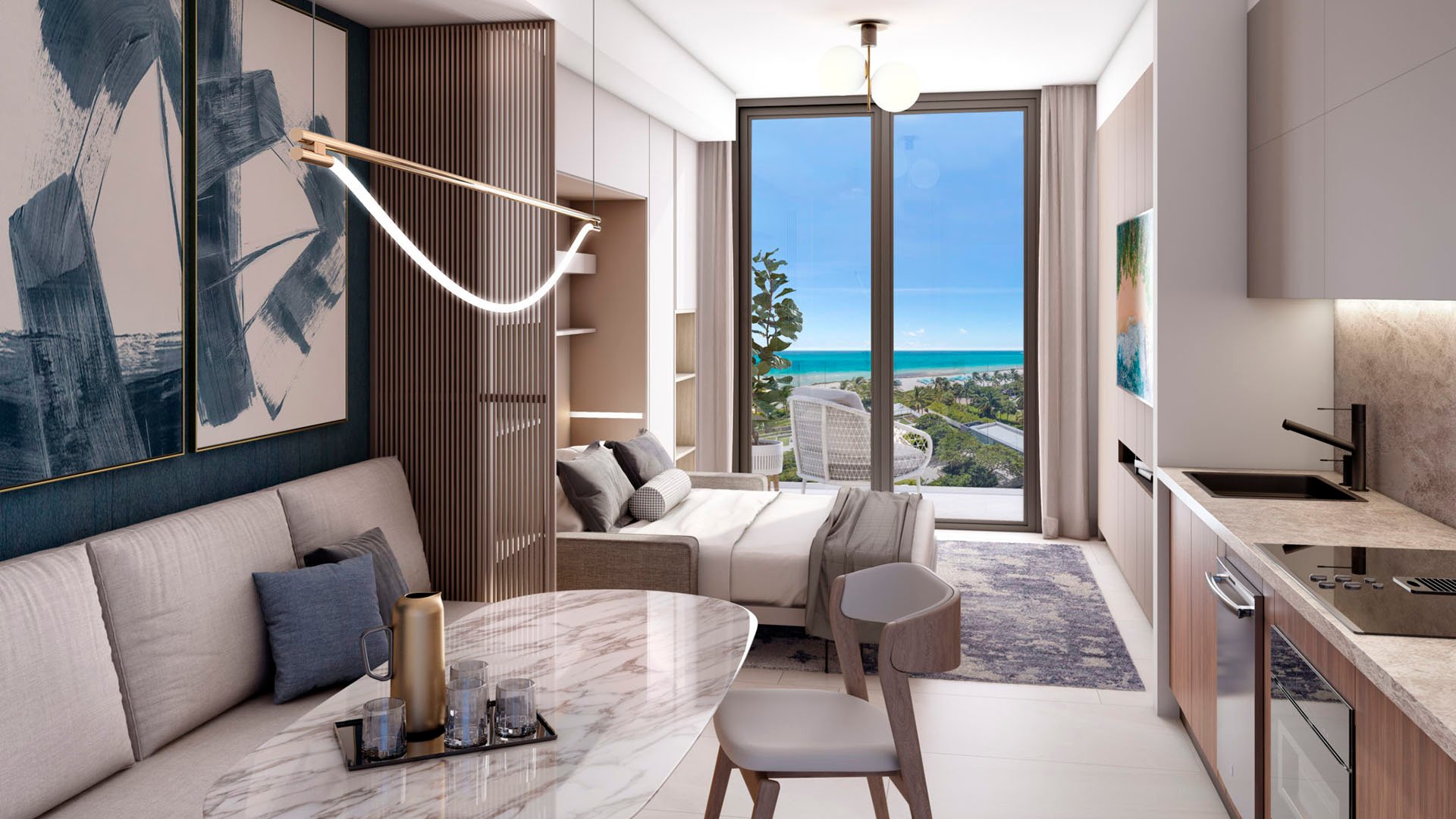 Shoma Bay North Bay Village, Miami FL studio condo interior with open layout, kitchenette, dining nook and balcony with ocean view, representing luxury and ultra luxury preconstruction condos.