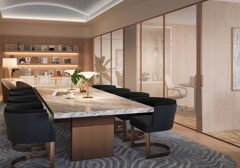 Shorecrest Flagler Drive coworking space on Flagler Drive, West Palm Beach, Florida, with marble conference table, lounge seating and glass-walled private offices - luxury, ultra luxury preconstruction condos amenity.