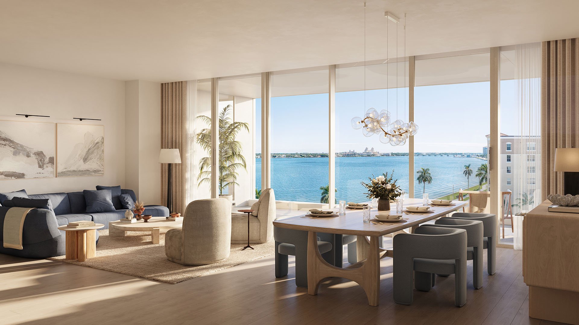 Shorecrest Flagler Drive open-concept living room and dining in West Palm Beach, Florida, with floor-to-ceiling windows and waterfront views - luxury and ultra luxury preconstruction condos residence interior.