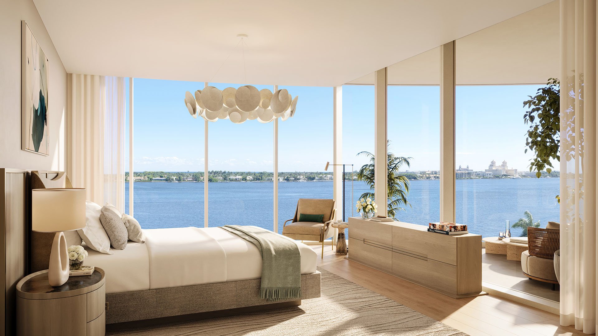 Shorecrest Flagler Drive waterfront bedroom suite in West Palm Beach, Florida, featuring floor-to-ceiling windows and serene water views - luxury and ultra luxury preconstruction condos primary suite.