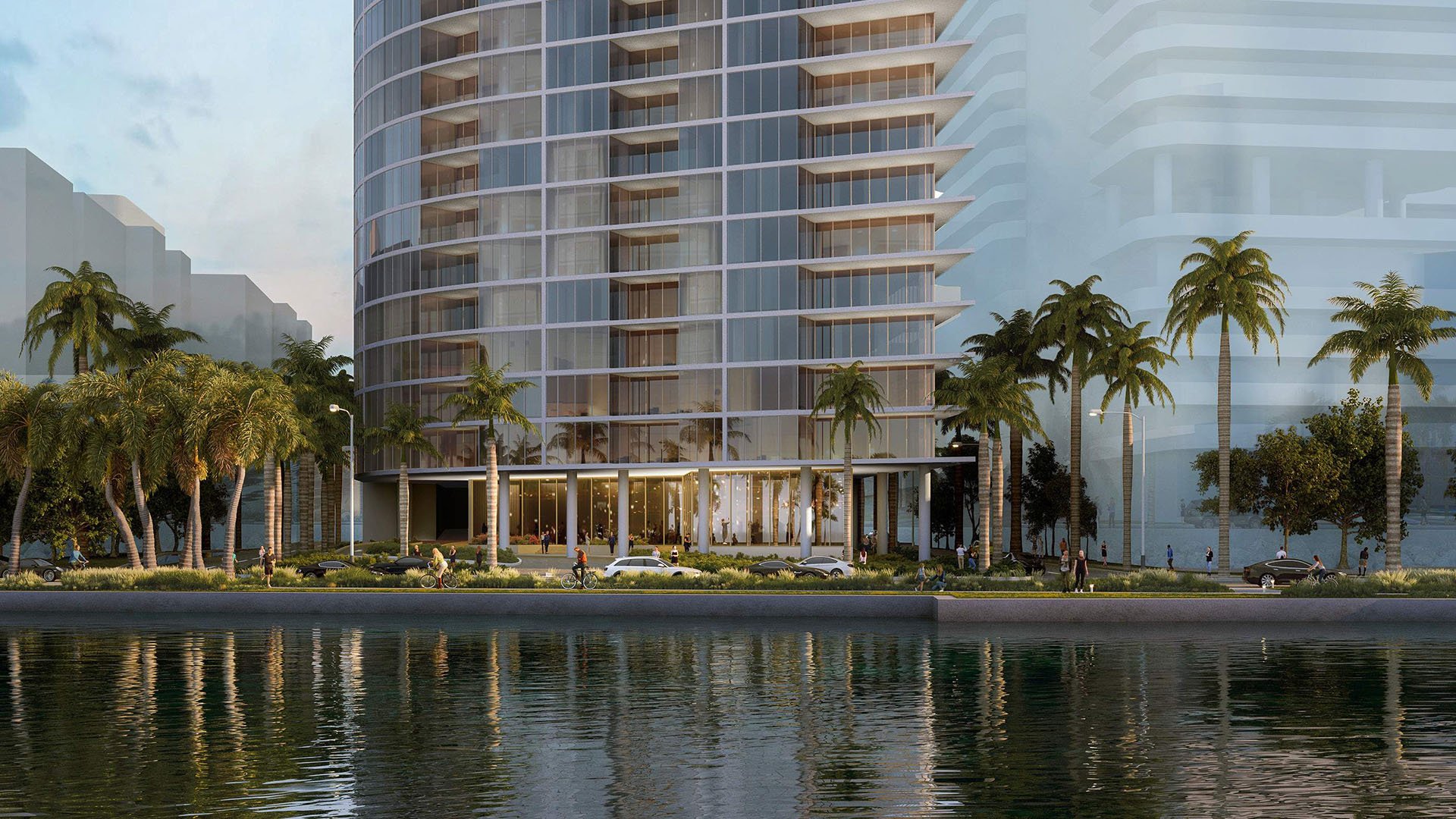 Shorecrest Flagler Drive, West Palm Beach, Florida waterfront residential tower exterior with palm-lined promenade, representing luxury and ultra luxury preconstruction condos on the Intracoastal Waterway.