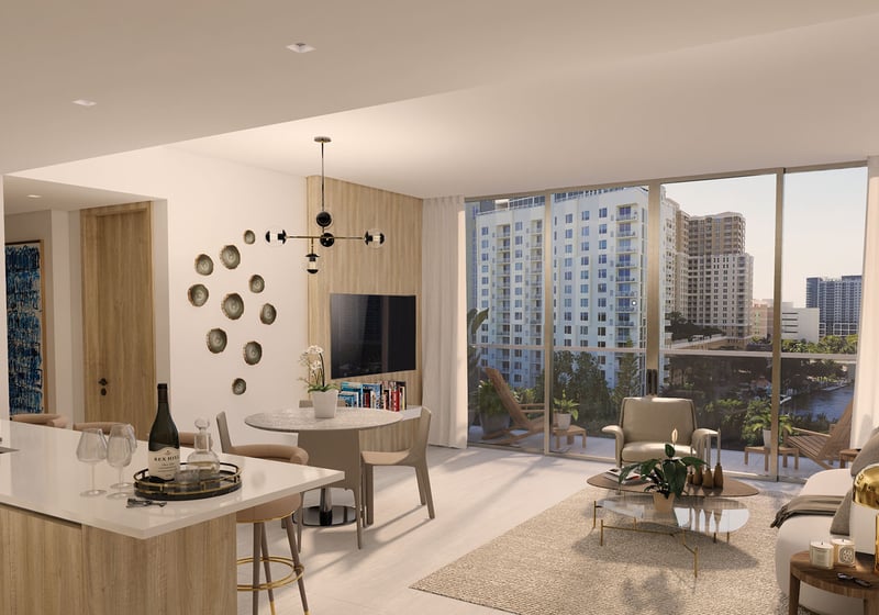 Sixth & Rio luxury and ultra luxury preconstruction condos in Fort Lauderdale, Florida, sunlit open-concept living room, kitchen and dining with island seating and floor-to-ceiling windows facing canal and city skyline.
