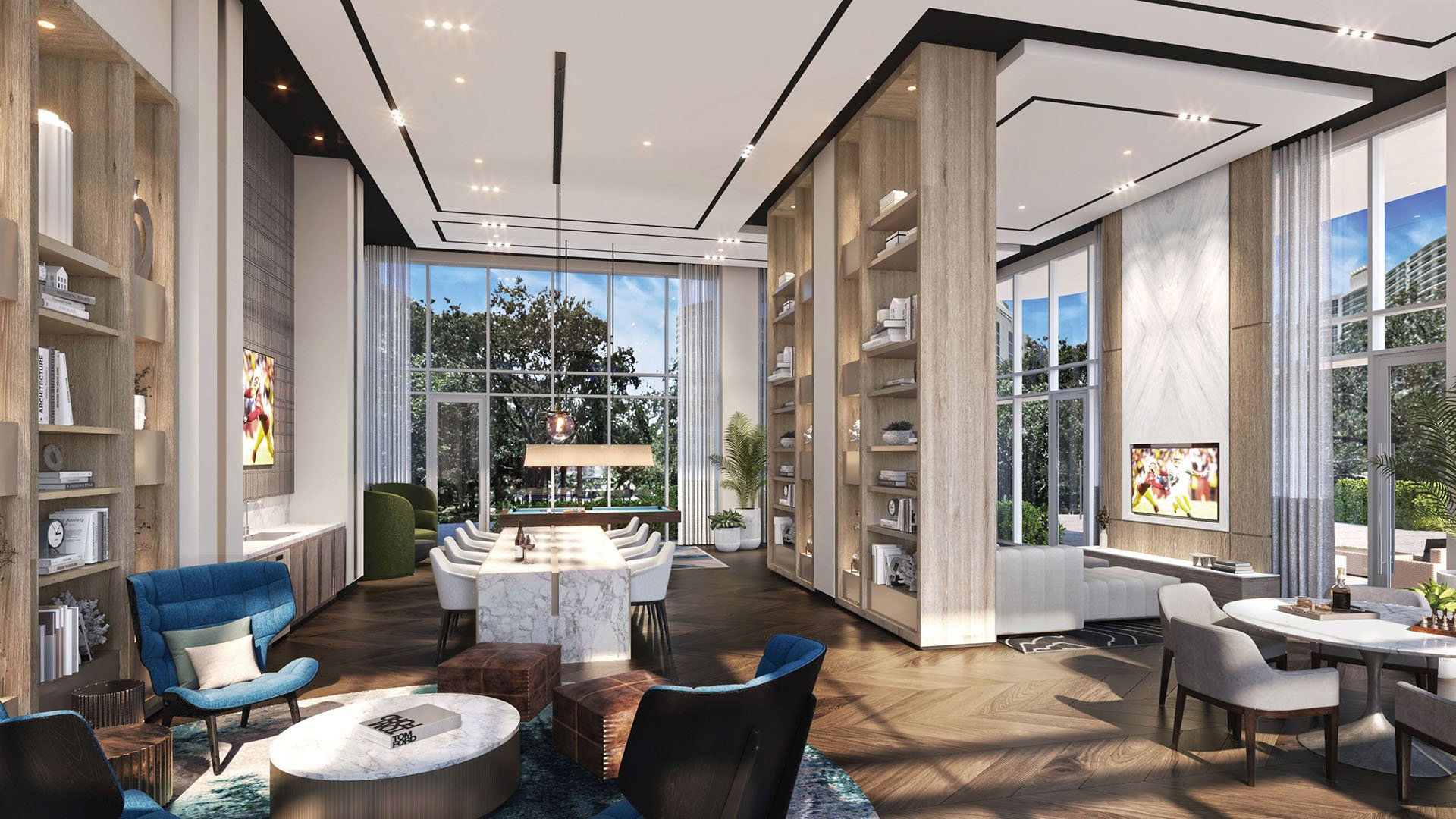 Sixth & Rio luxury and ultra luxury preconstruction condos in Fort Lauderdale, Florida, resident clubroom with lounge seating, long dining table, billiards and floor-to-ceiling windows.