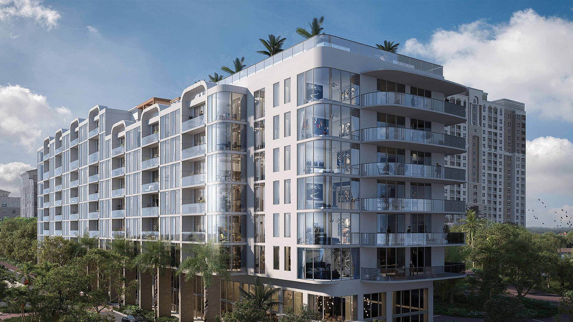 Sixth and Rio luxury condo exterior in Fort Lauderdale, FL, corner view with rounded glass balconies and rooftop terrace - ultra luxury preconstruction condos with modern architecture.