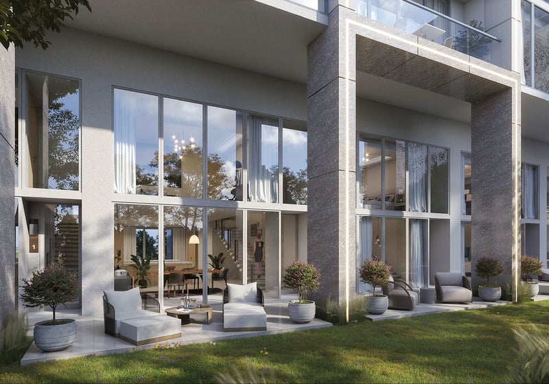 Sixth and Rio ground-floor patio lounge in Fort Lauderdale, FL, with floor-to-ceiling windows, outdoor seating and landscaped gardens - luxury and ultra luxury preconstruction condos lifestyle.