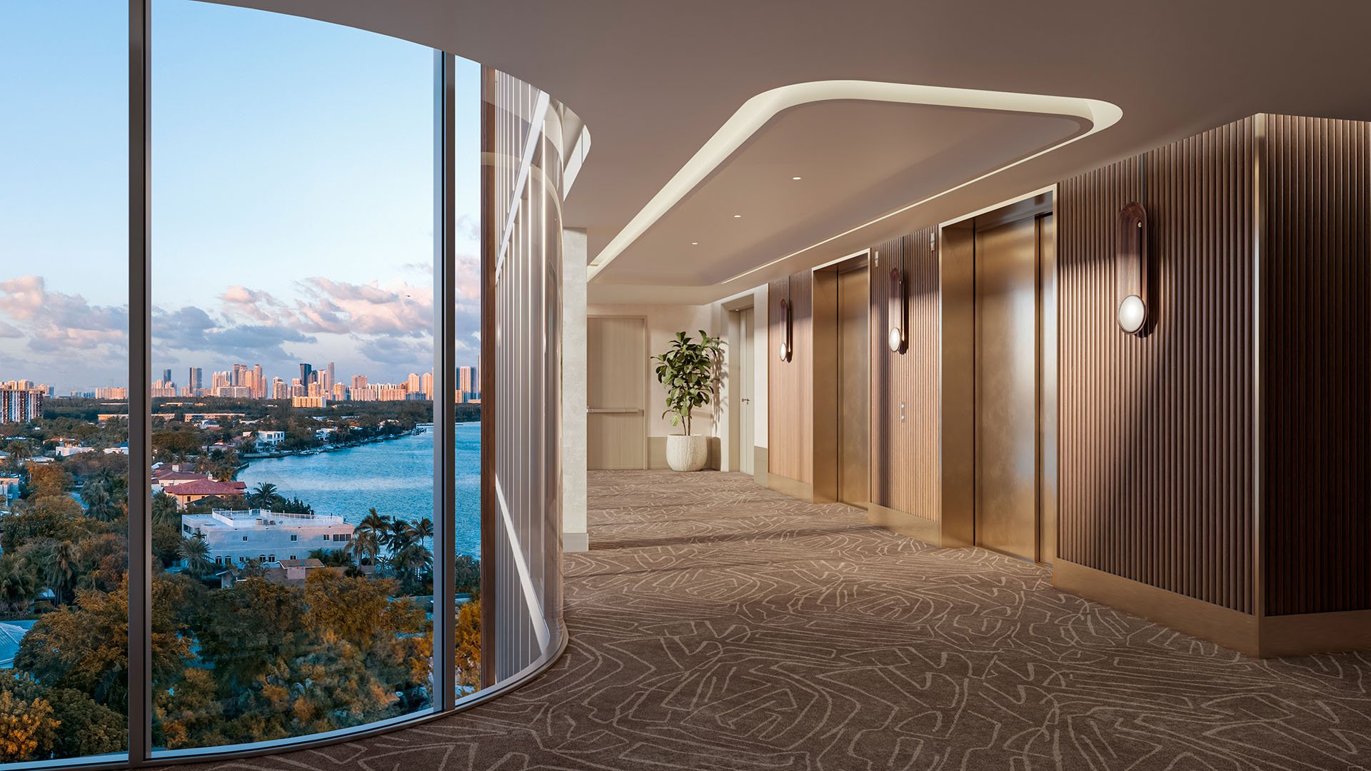 Solana Bay North Miami Beach, Florida elevator lobby corridor with bronze doors, curved glass wall and city-skyline water views, showcasing luxury and ultra luxury preconstruction condos.