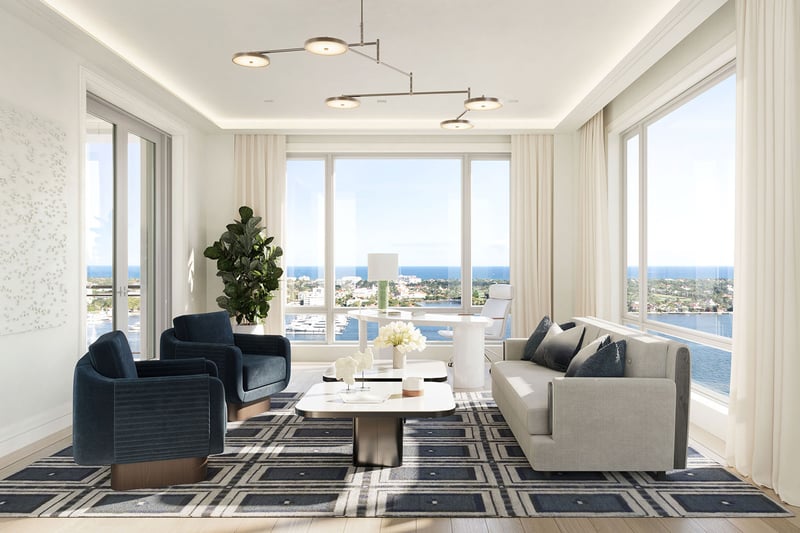 Office lounge with seating, desk area and corner waterfront views at South Flagler House in West Palm Beach, emphasizing luxury and ultra luxury condos with refined work-from-home space.