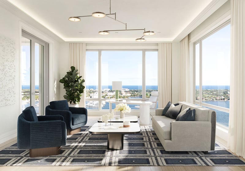 Office lounge with seating, desk area and corner waterfront views at South Flagler House in West Palm Beach, emphasizing luxury and ultra luxury condos with refined work-from-home space.
