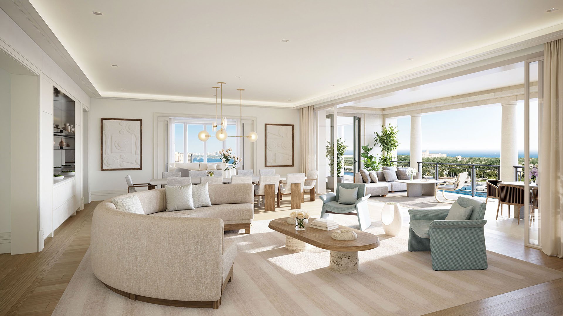 Open living and dining room flowing to a covered terrace with ocean views at South Flagler House in West Palm Beach, featuring luxury and ultra luxury condos with seamless indoor outdoor entertaining.