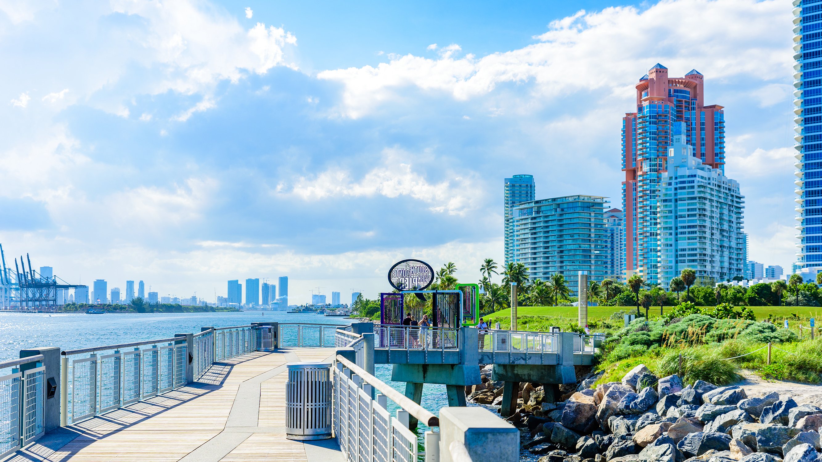 South of Fifth, Miami Beach pier and skyline on the water, prime zone for luxury and ultra luxury condos; preconstruction and resale. Featuring cityscape and waterfront.