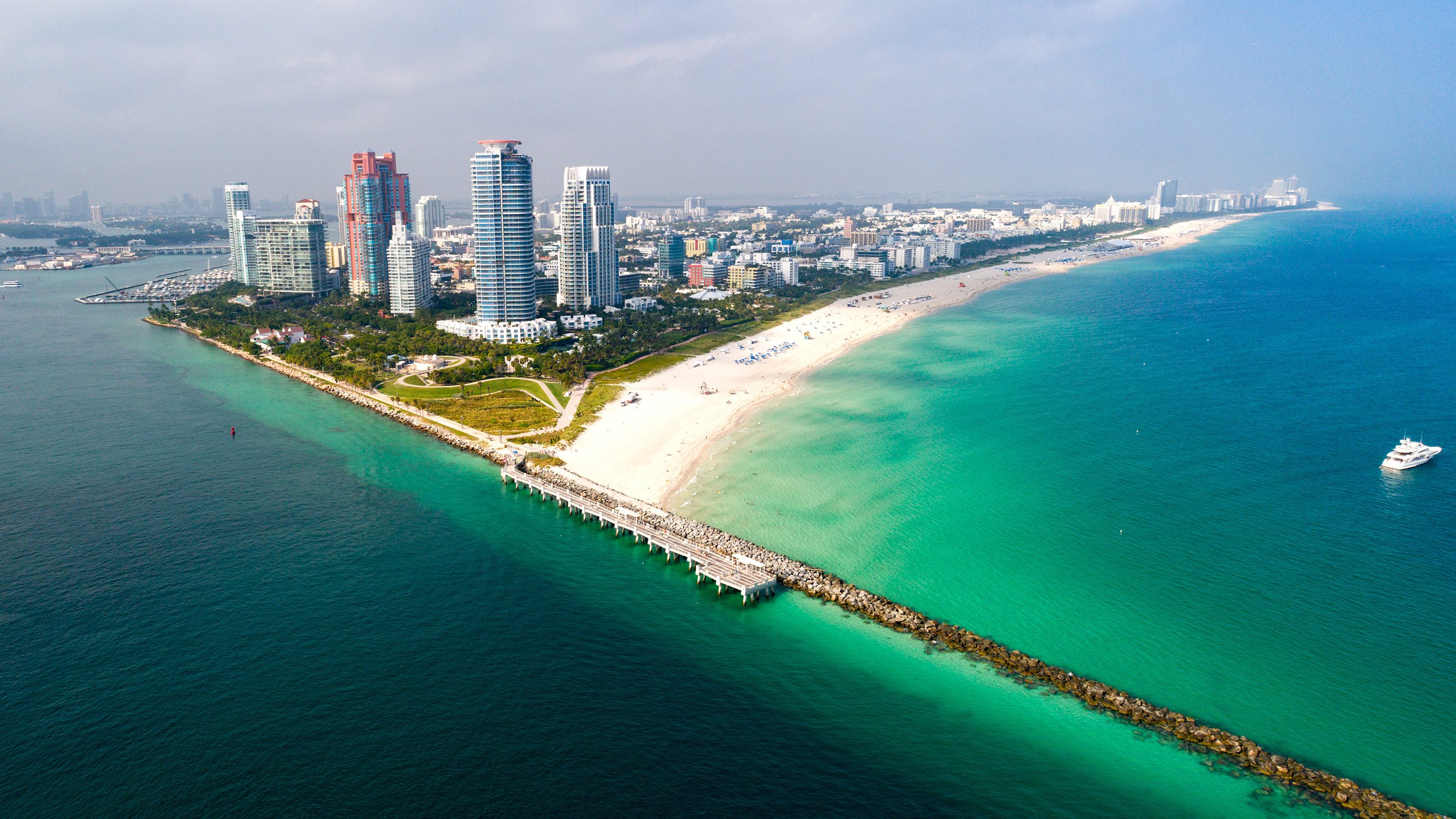 South of Fifth, Miami Beach skyline aerial with ocean and bay, iconic corridor of luxury and ultra luxury condos; preconstruction and resale. Featuring view.
