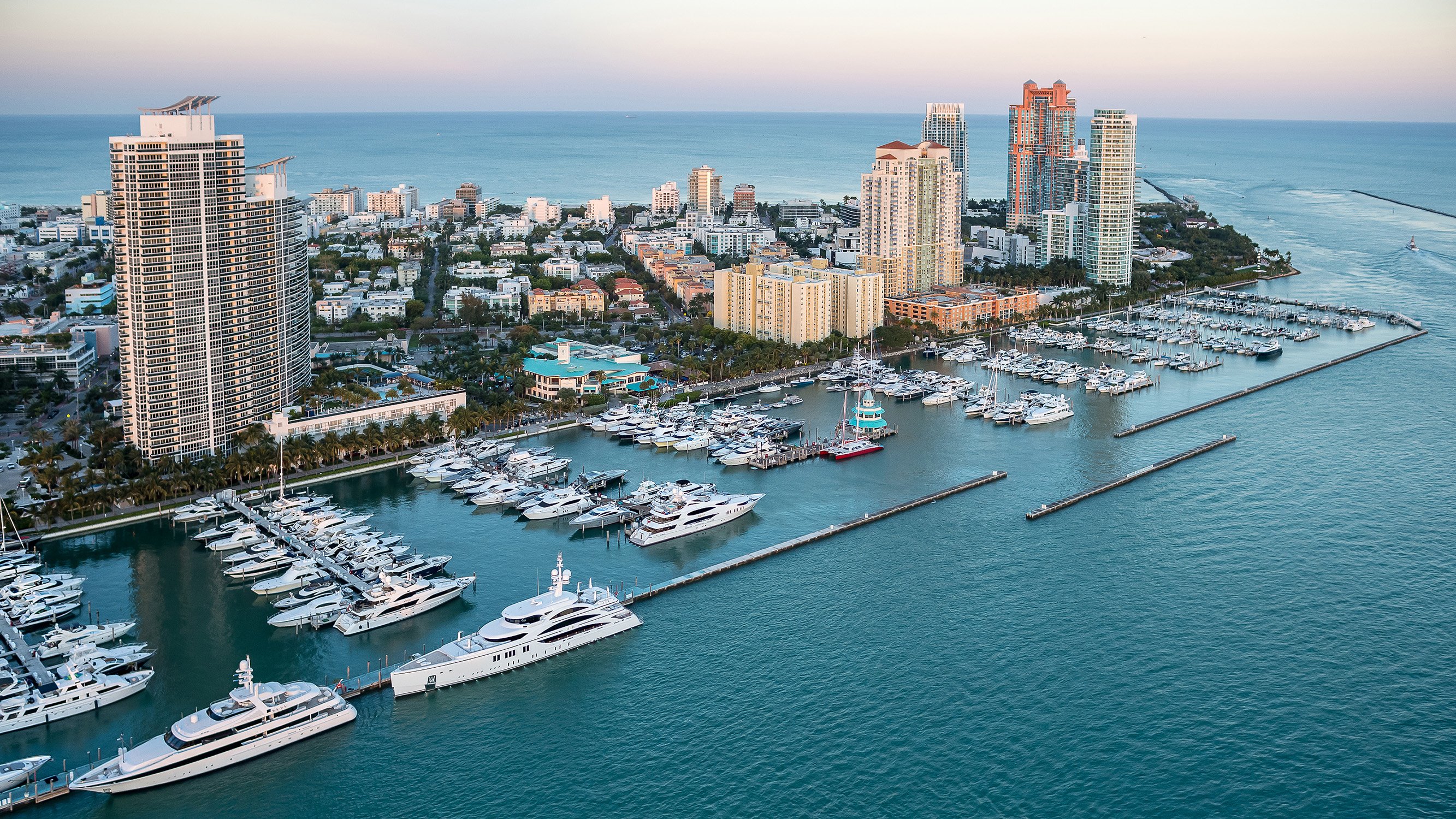 South of Fifth, Miami Beach sunset view over the marina, waterfront lifestyle surrounded by luxury and ultra luxury condos; preconstruction and resale.