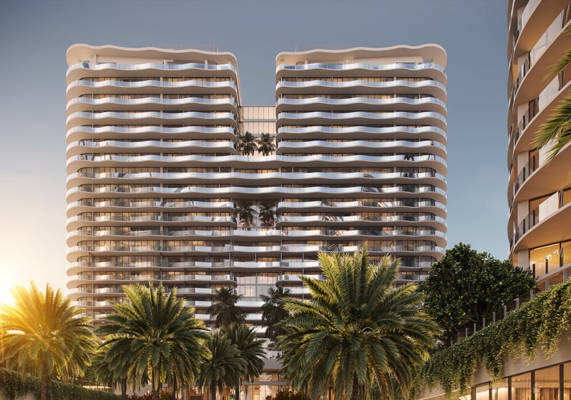 St. Regis Bahia Mar Residences modern tower with palms at sunset, Fort Lauderdale Beach; luxury architecture for ultra luxury condos, preconstruction. Featuring architectural, building, and palm trees.