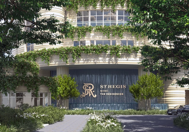 St. Regis Brickell luxury residences in Miami featuring elegant architecture, lush landscaping, and exclusive entrance design. Featuring exterior.