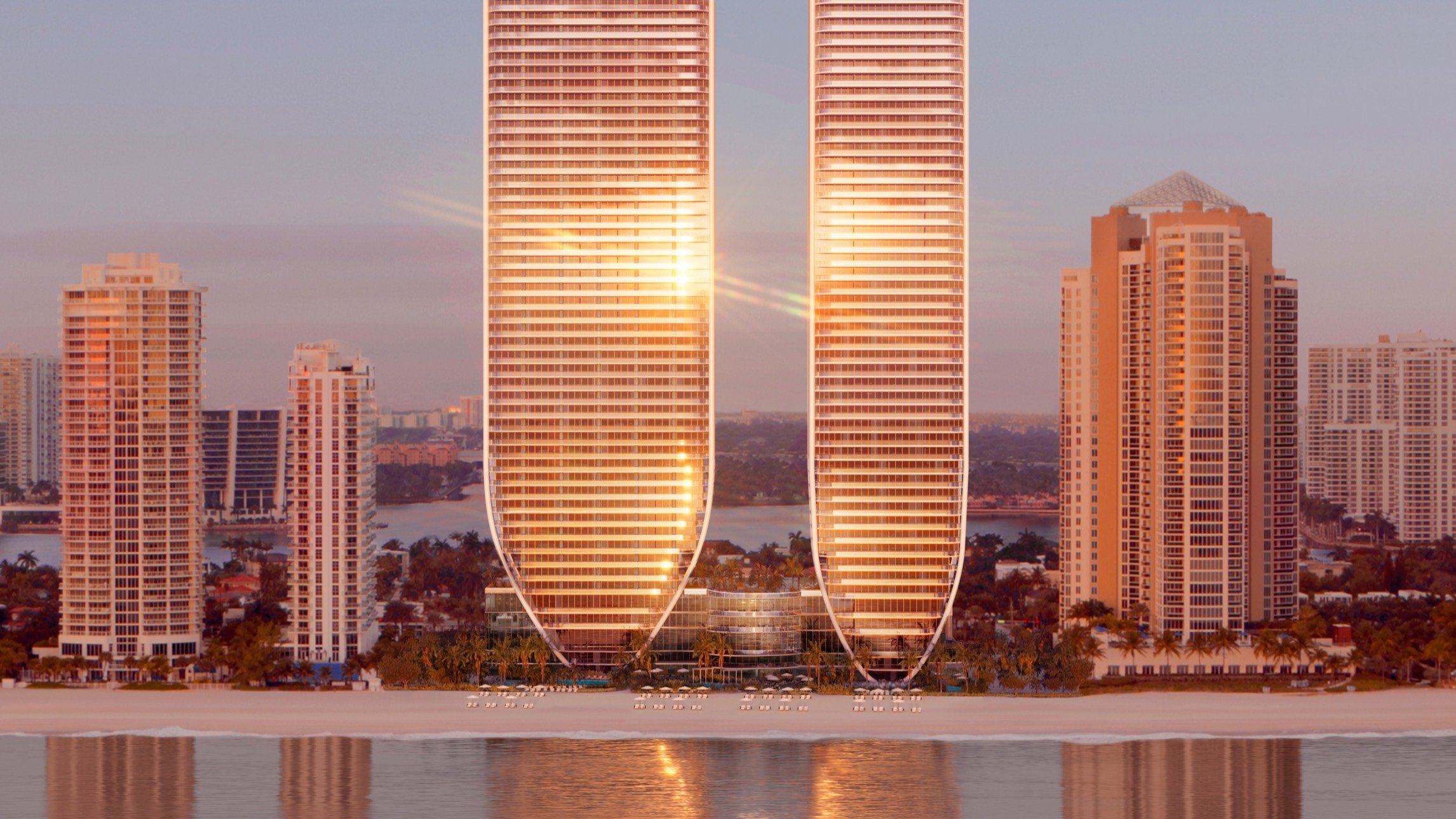 St. Regis Sunny Isles, Sunny Isles Beach beachfront high‑rises at sunset—oceanfront skyline of luxury and ultra luxury condos; preconstruction.