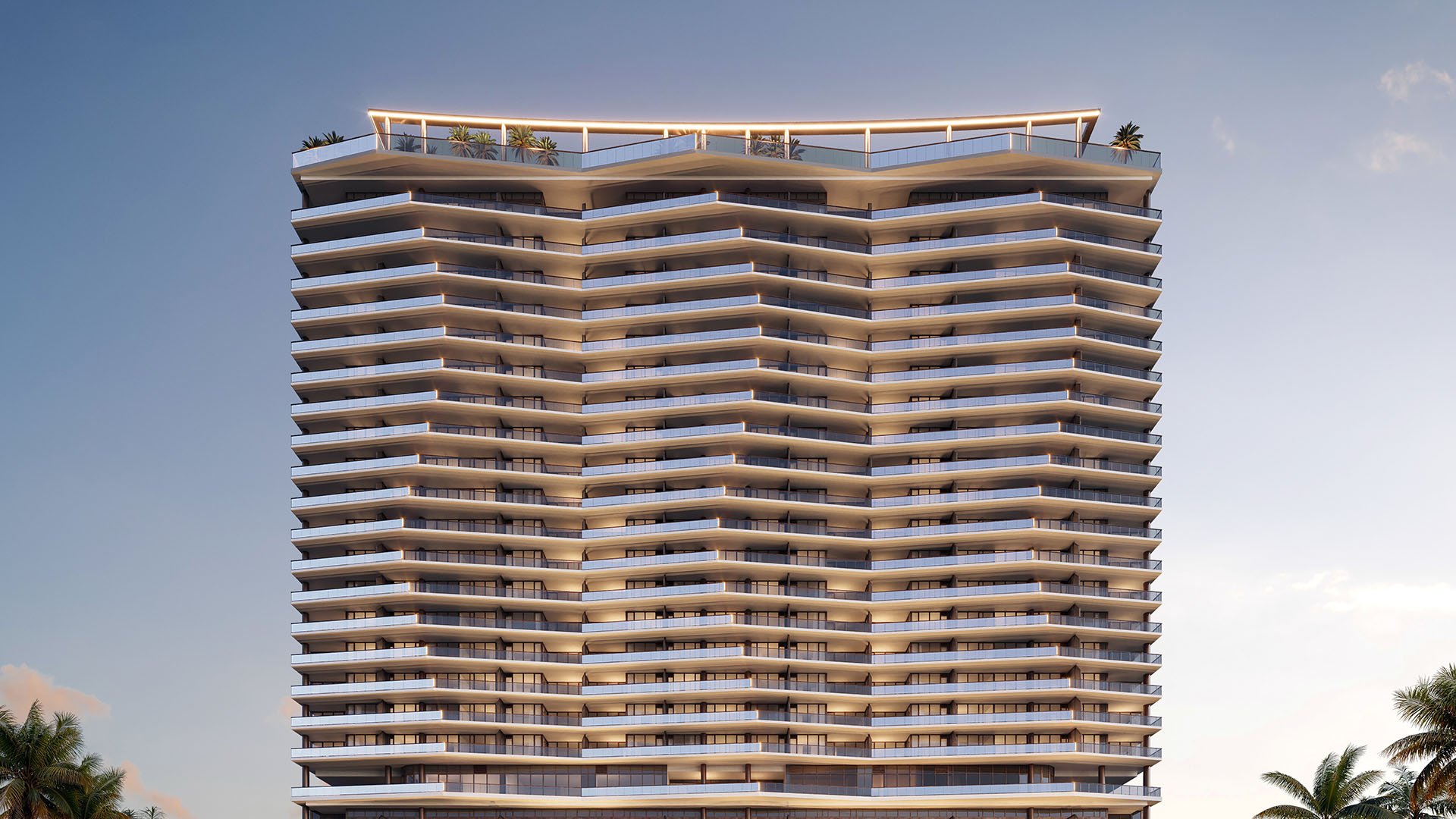 Front view of the curving tower with illuminated balcony lines at The Berkeley in West Palm Beach, presenting luxury and ultra luxury condos with a distinctive contemporary waterfront exterior.