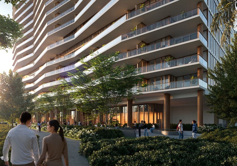 Landscaped arrival walkway beneath the curving condo façade at The Berkeley in West Palm Beach, highlighting luxury and ultra luxury condos with lush streetfront architecture and pedestrian-friendly design.