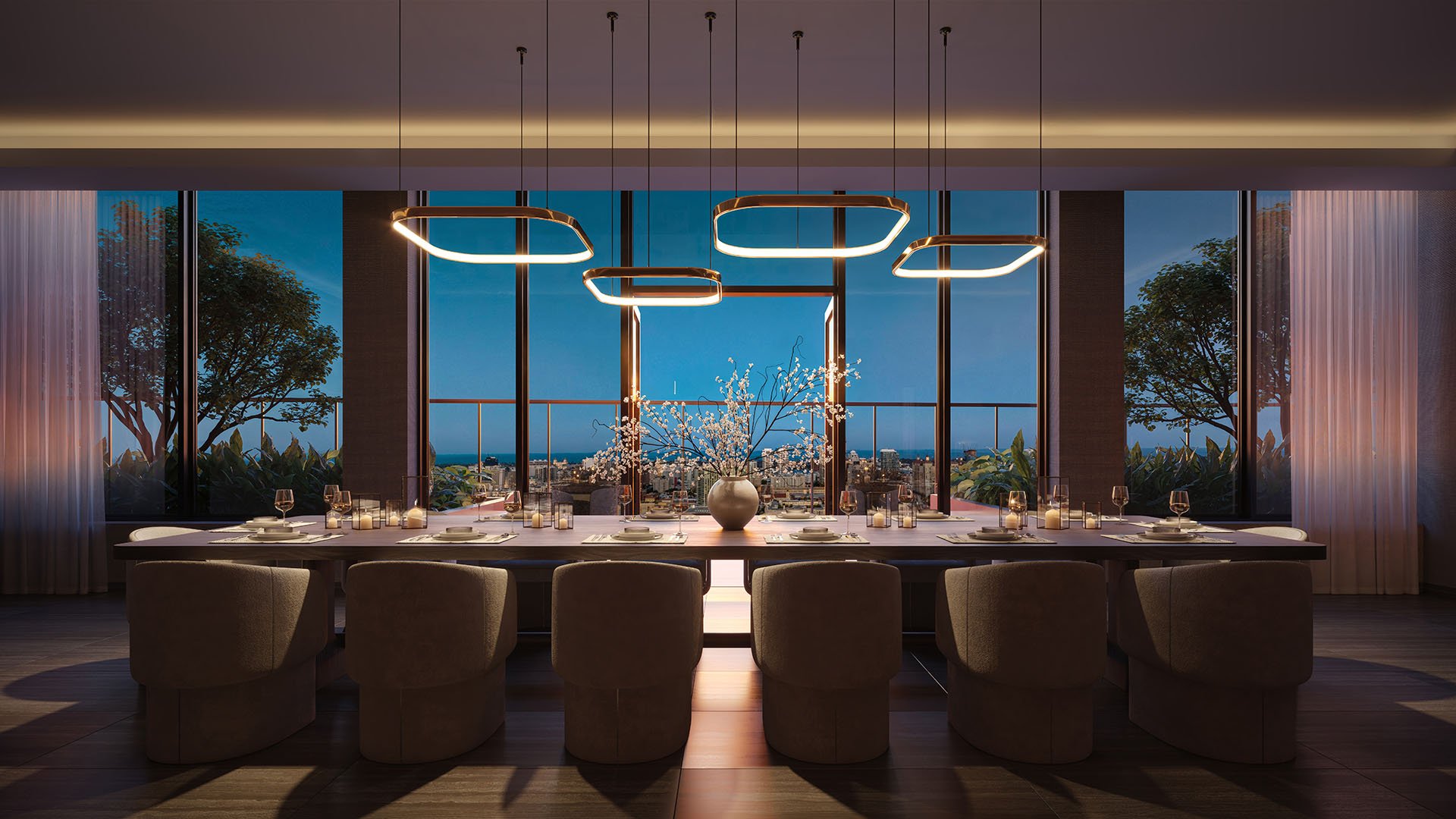 Private dining room with designer pendant lighting, a long table, and city views at The Berkeley in West Palm Beach, showcasing luxury and ultra luxury condos with intimate entertaining space.