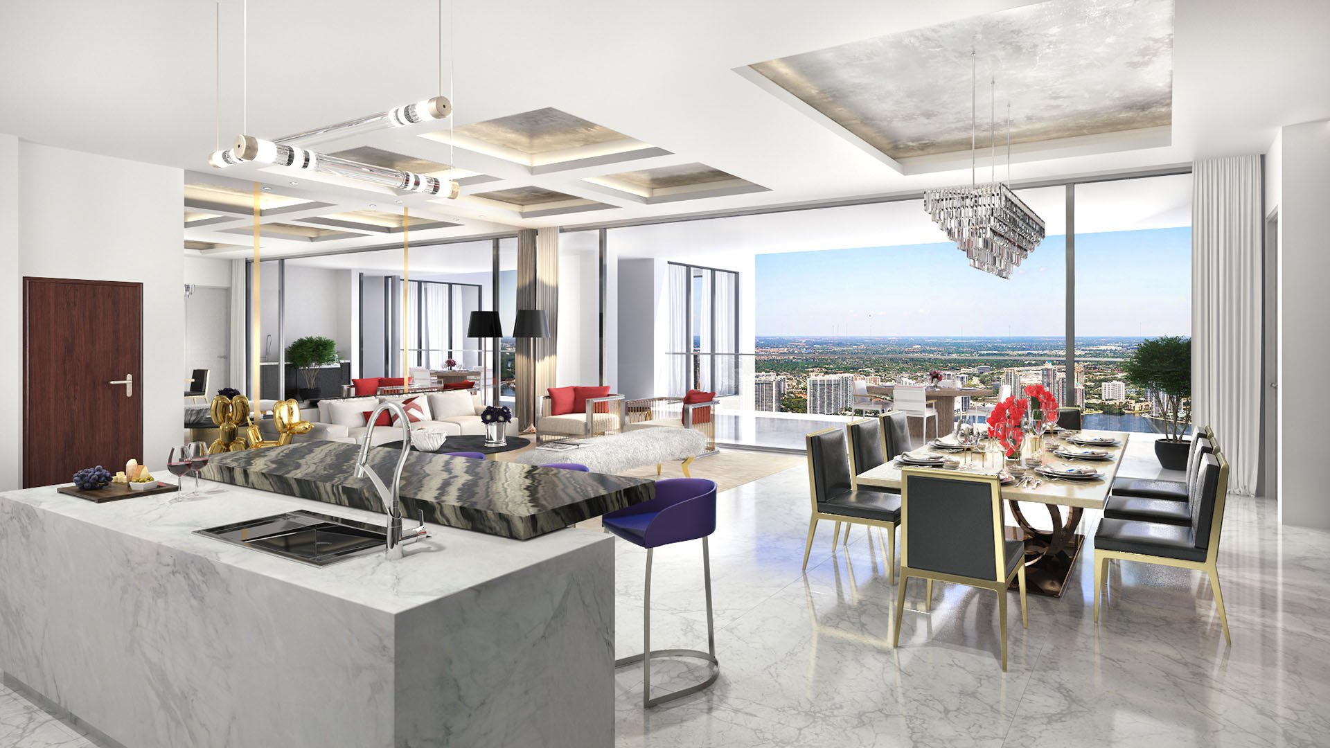 Marble island kitchen and dining room with broad city views at The Estates at Acqualina, Sunny Isles Beach, a community of luxury and ultra luxury condos.