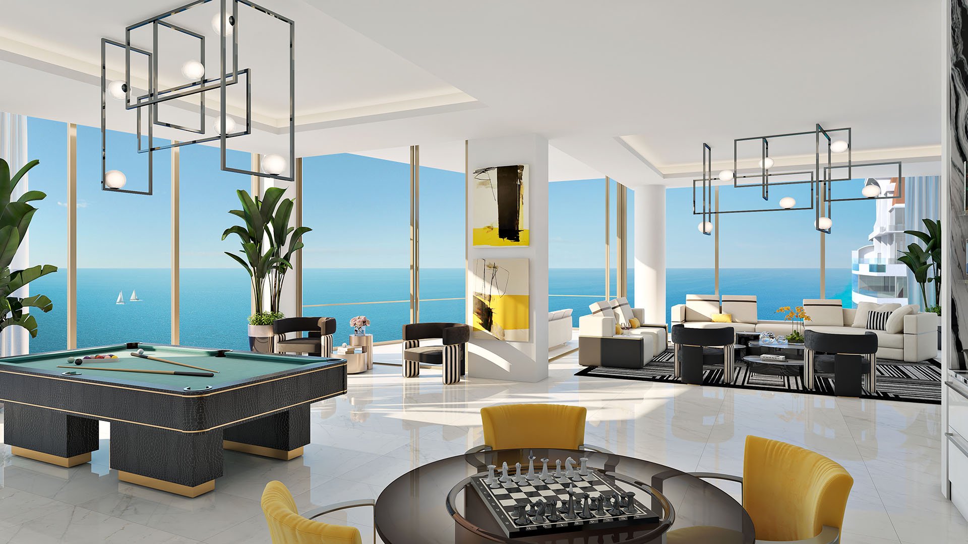 Ocean-view game room with billiards, chess, and lounge seating at The Estates at Acqualina, Sunny Isles Beach, a community of luxury and ultra luxury condos.